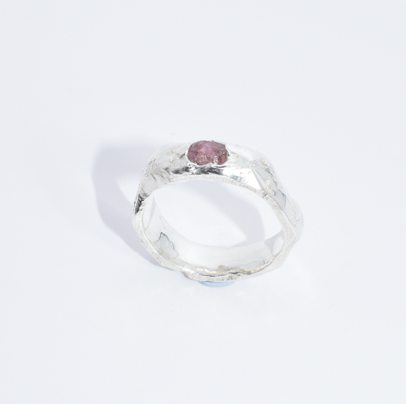 handmade silver ring with pink winza sapphire set in the front
